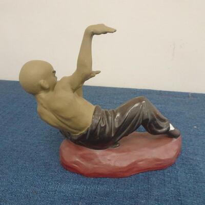 LOT 273. KUNG FU FIGURINE