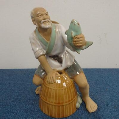 LOT 274. MUD MEN FIGURINES