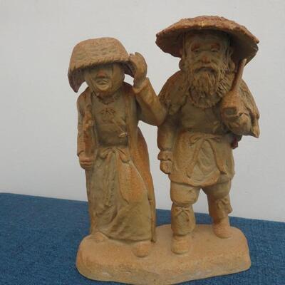 LOT 276  COUPLE SIGNED FIGURINE