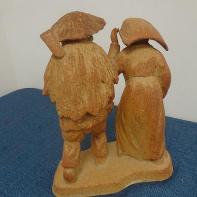 LOT 276  COUPLE SIGNED FIGURINE
