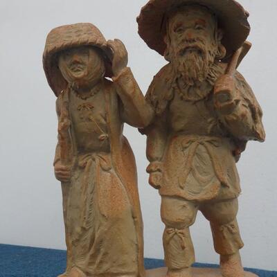 LOT 276  COUPLE SIGNED FIGURINE