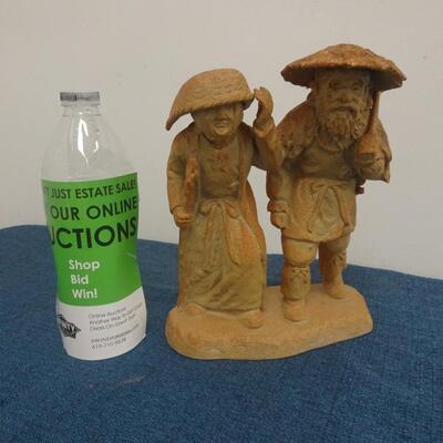 LOT 276  COUPLE SIGNED FIGURINE