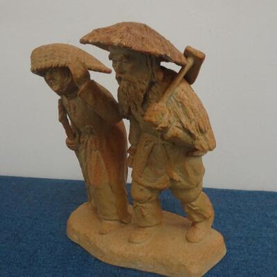 LOT 276  COUPLE SIGNED FIGURINE