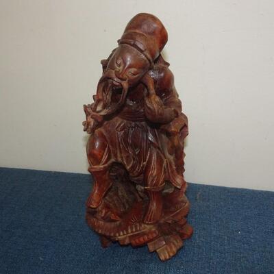 LOT 284 WOOD CARVED FIGURINE