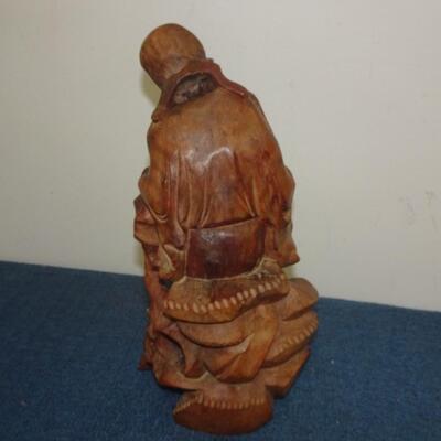 LOT 284 WOOD CARVED FIGURINE