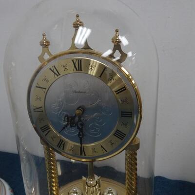 LOT 300 FOUR ANNIVERSARY CLOCKS