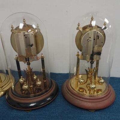 LOT 300 FOUR ANNIVERSARY CLOCKS