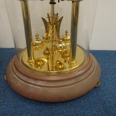 LOT 300 FOUR ANNIVERSARY CLOCKS
