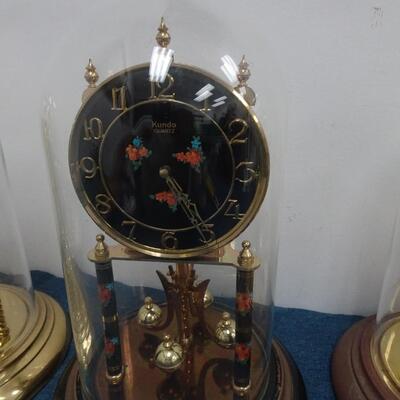 LOT 300 FOUR ANNIVERSARY CLOCKS