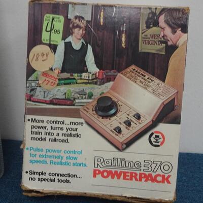 LOT 308.  MISC ITEMS. MARBLES, MODEL RAIL ROAD POWER PACK AND VCR CO PILOT