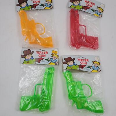 80S SQUIRT GUNS - NEW UNOPENED