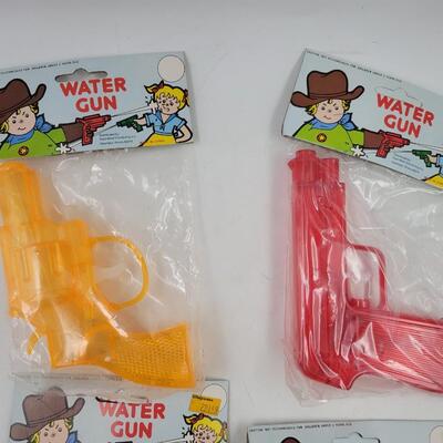 80S SQUIRT GUNS - NEW UNOPENED
