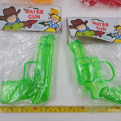 80S SQUIRT GUNS - NEW UNOPENED