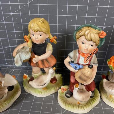 Goose Loving German Children Figurines (4) 