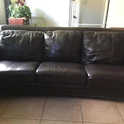 Curved Brown Leather Couch