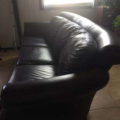 Curved Brown Leather Couch