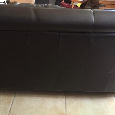 Curved Brown Leather Couch