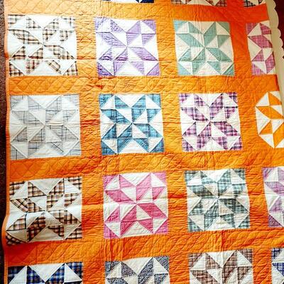 HAND STITCHED? BEAUTIFUL ORANGE AND MULTI COLORED QUILT