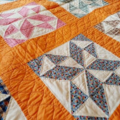 HAND STITCHED? BEAUTIFUL ORANGE AND MULTI COLORED QUILT