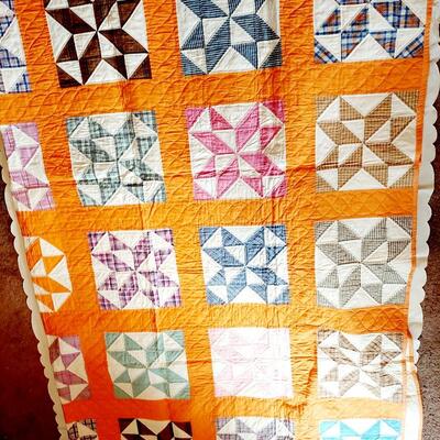 HAND STITCHED? BEAUTIFUL ORANGE AND MULTI COLORED QUILT