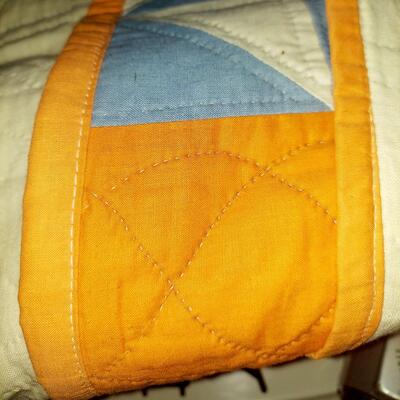 HAND STITCHED? BEAUTIFUL ORANGE AND MULTI COLORED QUILT