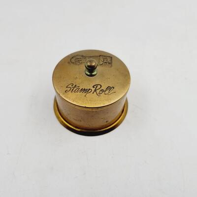 VINTAGE METAL ROLL OF STAMPS HOLDER