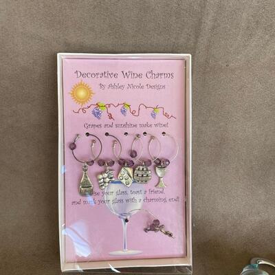 Lot 33. Assortment of Wine Charms and Bottle Stoppers