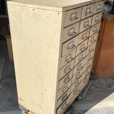 Steel 27-drawer file storage cabinet, full of vintage radio tubes