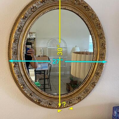 Lot 70. Oval Framed Mirror