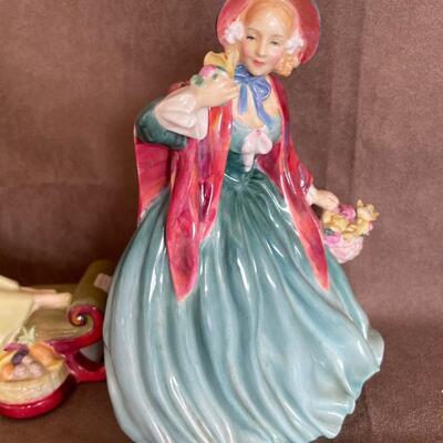 Lot 73  Two Royal Doulton Figurines