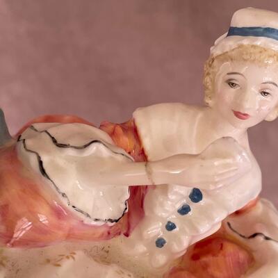 Lot 74. Two Royal Doulton Figurines