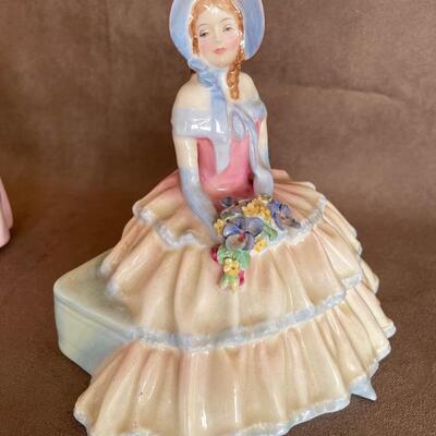 Lot 76. Two Royal Doulton Figurines