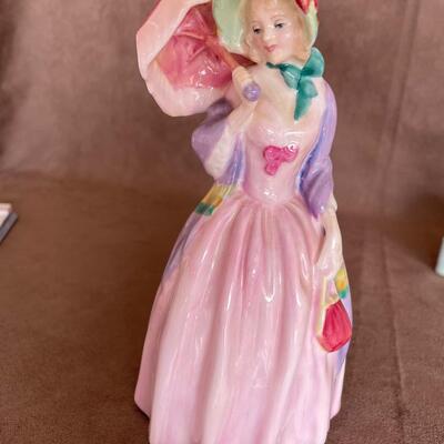 Lot 76. Two Royal Doulton Figurines