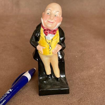 Lot 77. Three Royal Doulton figurines