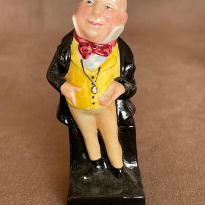 Lot 77. Three Royal Doulton figurines