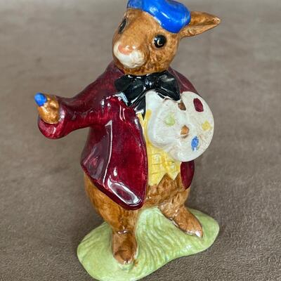 Lot 77. Three Royal Doulton figurines