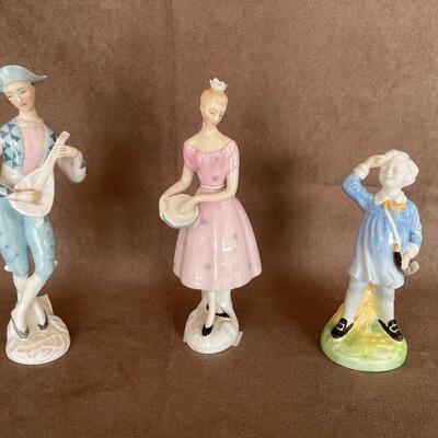 Lot 78. Three Royal Doulton Figurines