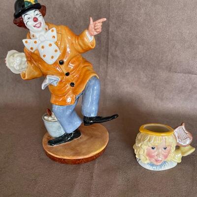 Lot 84. Two Royal Doulton Figurines