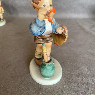 Lot 85. Two Hummel Figurines