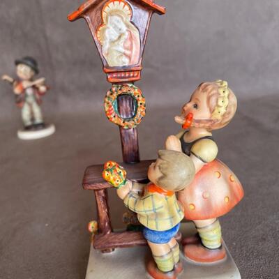 Lot 87. Two  Goeble Hummel Figurines