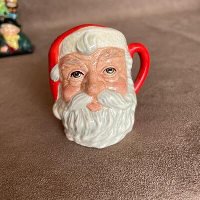 Lot 88 Three Royal Doulton Figurines - Santa