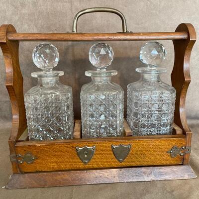Lot 111  Vintage Liquor Decanter Set with Stand