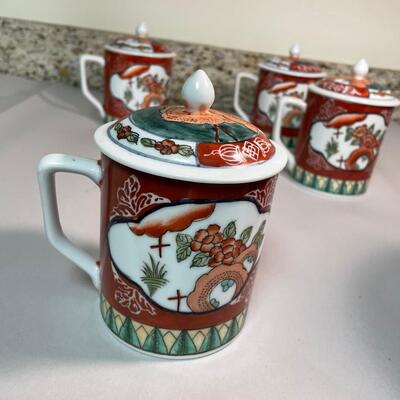 Lot 144 Porcelain Covered Mugs