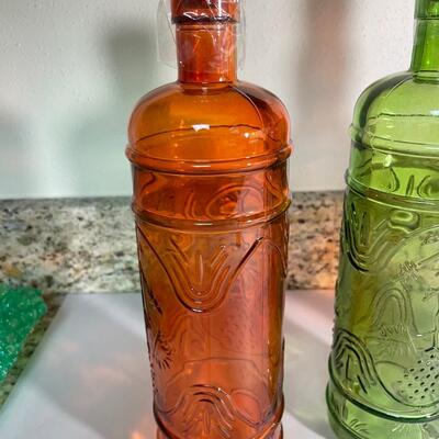 Lot 188. Five Colored Glass Bottles