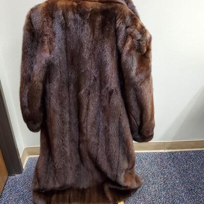 Luxurious dark brown knee length coat