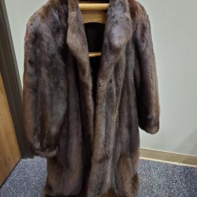 Luxurious dark brown knee length coat