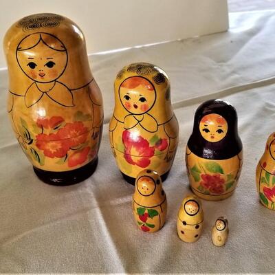 Lot #36  Two sets of Russian Style Nesting Dolls