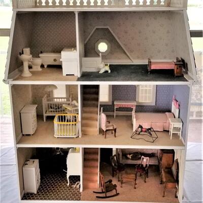 Lot #37  Dollhouse with furniture on Swivel Base