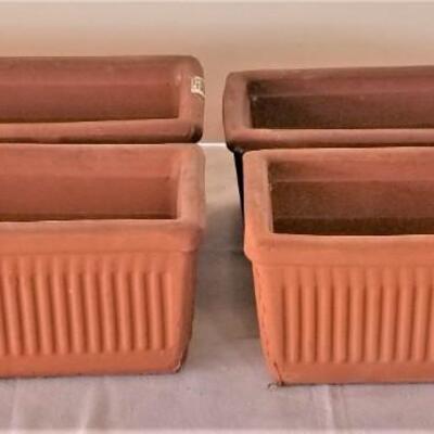 Lot #40  Set of Four Terra Cotta Window Planters