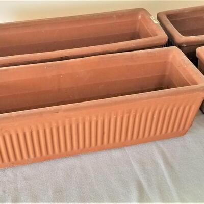 Lot #40  Set of Four Terra Cotta Window Planters